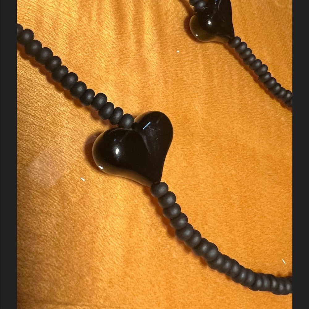 4 Phone charms, 
black hearts
Great gift
Party gifts
New without tags